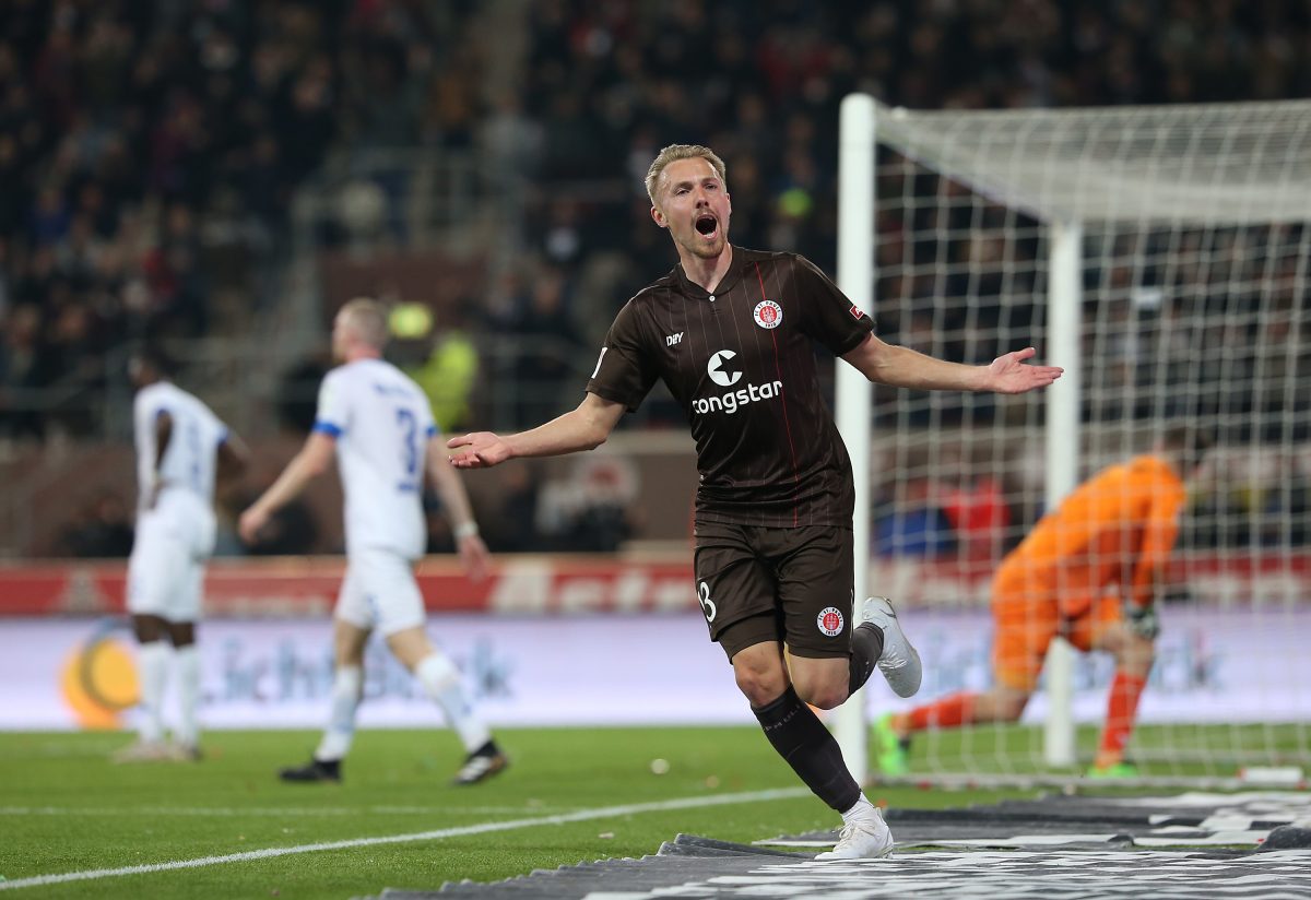 HAMBURG, GERMANY - APRIL 23: Lukas Daschner of FC St. Pauli celebrates after scoring his sides first goal during the Second Bundesliga match between FC St. Pauli and SV Darmstadt 98 at Millerntor Stadium on April 23, 2022 in Hamburg, Germany.
