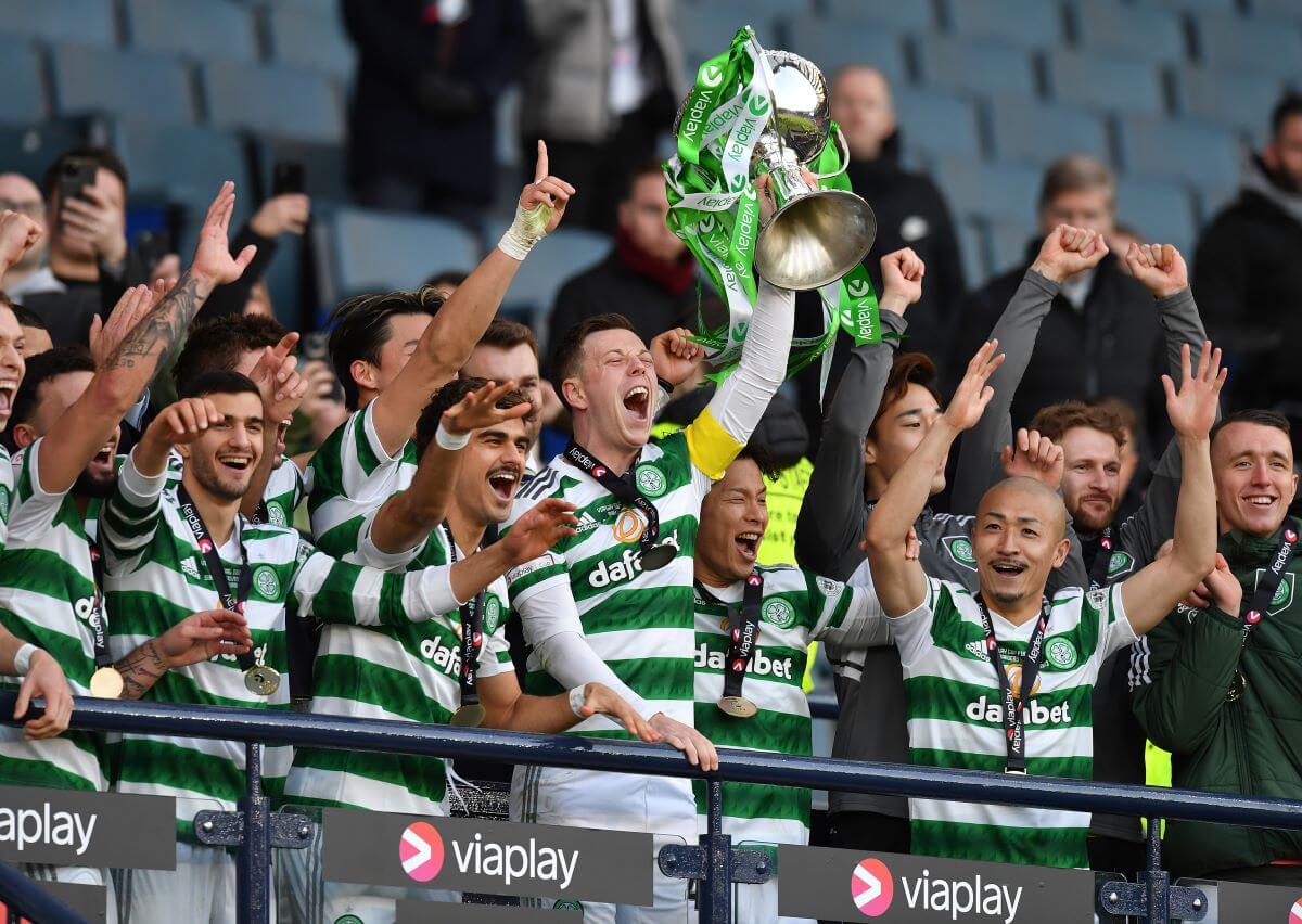 Celtic captain Callum McGregor lifts the trophy at the final whistle as Celtic beat Rangers 2-1 in the Viaplay League Cup Final at Hampden Park on February 26, 2023 in Glasgow