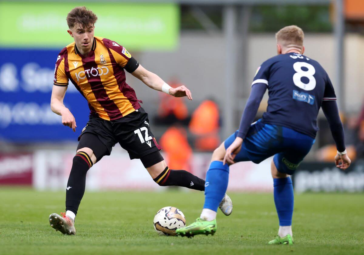 BRADFORD, ENGLAND - MAY 14: Scott Banks of Bradford City runs with the ball during the Sky Bet League Two Play-Off Semi-Final First Leg match between Bradford City and Carlisle United at University of Bradford Stadium on May 14, 2023 in Bradford, England. (Photo by George Wood/Getty Images)