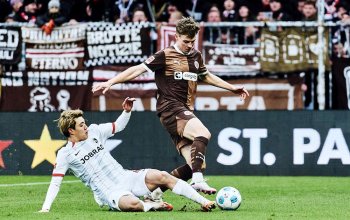 Hamburg, Deutschland, 15.02.2025, Millerntor-Stadion, Fussball, Bundesliga, FC St. Pauli - SC Freiburg David Nemeth (FC St. Pauli) im Zweikampf mit Ritsu Doan (SC Freiburg) Copyright: Stefan Groenveld