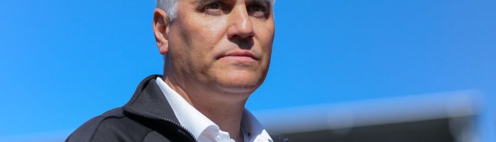 KIEL, GERMANY - APRIL 12: Manager Andreas Bornemann of St. Pauli looks on prior to the Bundesliga match between Holstein Kiel and FC St. Pauli 1910 at Holstein-Stadion on April 12, 2025 in Kiel, Germany. (Photo by Selim Sudheimer/Getty Images)