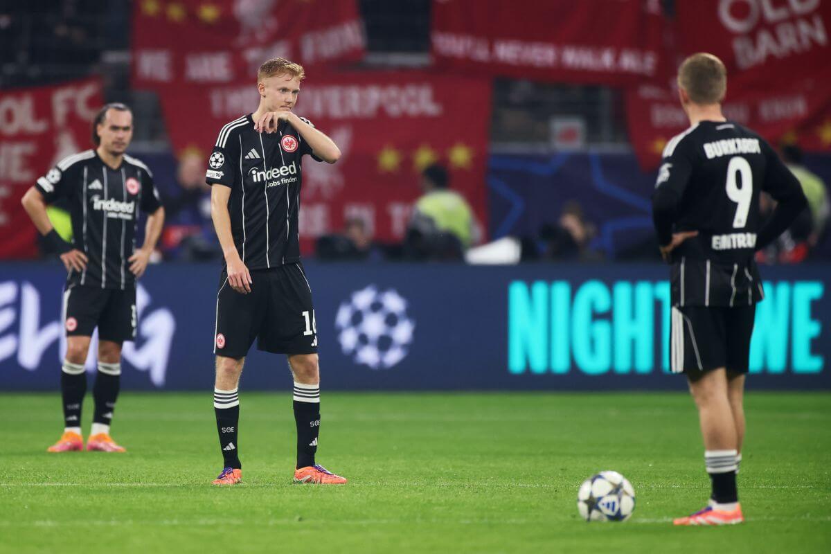 RANKFURT AM MAIN, GERMANY - OCTOBER 22: Hugo Larsson of Eintracht Frankfurt reacts after Cody Gakpo of Liverpool (not pictured) scored their sides fourth goal during the UEFA Champions League 2025/26 League Phase MD3 match between Eintracht Frankfurt and Liverpool FC