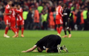 MUNICH, GERMANY - NOVEMBER 29: Karol Mets of St Pauli reacts following defeat in the Bundesliga match between FC Bayern München and FC St. Pauli at Allianz Arena on November 29, 2025 in Munich, Germany. (Photo by Alexander Hassenstein/Getty Images)