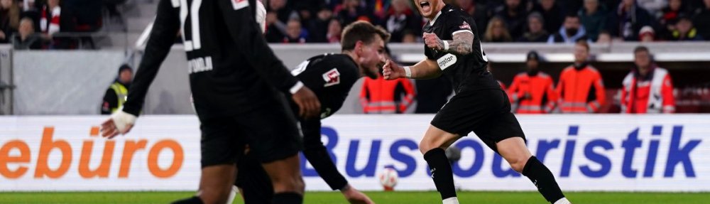FREIBURG IM BREISGAU, GERMANY - NOVEMBER 09: Louis Oppie of St Pauli celebrates scoring his team's first goal during the Bundesliga match between SC Freiburg and FC St. Pauli at Europa-Park Stadion on November 09, 2025 in Freiburg im Breisgau, Germany. (Photo by Daniela Porcelli/Getty Images)