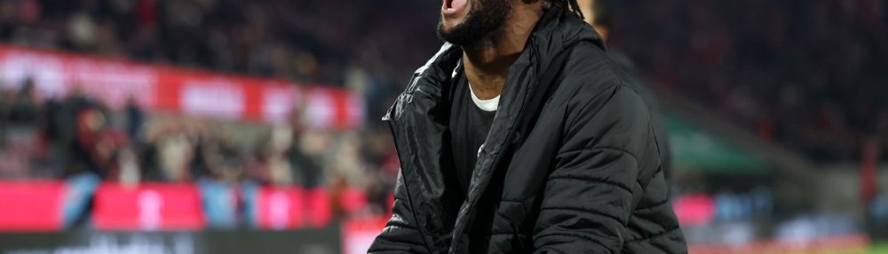 COLOGNE, GERMANY - DECEMBER 06: Ricky Jade-Jones of FC St. Pauli celebrates after the team's victory during the Bundesliga match between 1. FC Köln and FC St. Pauli at RheinEnergieStadion on December 06, 2025 in Cologne, Germany. (Photo by Lars Baron/Getty Images)
