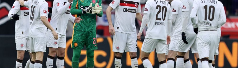 LEVERKUSEN, GERMANY - FEBRUARY 14: The team of FC St. Pauli comes together prior to the Bundesliga match between Bayer 04 Leverkusen and FC St. Pauli at BayArena on February 14, 2026 in Leverkusen, Germany. (Photo by Christof Koepsel/Getty Images)