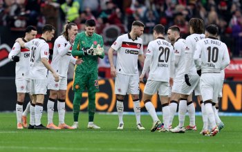 LEVERKUSEN, GERMANY - FEBRUARY 14: The team of FC St. Pauli comes together prior to the Bundesliga match between Bayer 04 Leverkusen and FC St. Pauli at BayArena on February 14, 2026 in Leverkusen, Germany. (Photo by Christof Koepsel/Getty Images)