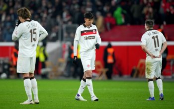 LEVERKUSEN, GERMANY - FEBRUARY 03: Taichi Hara of FC St. Pauli looks dejected following the team's defeat during the DFB Cup Quarter Final match between Bayer 04 Leverkusen and FC St. Pauli at BayArena on February 03, 2026 in Leverkusen, Germany. (Photo by Pau Barrena/Getty Images)