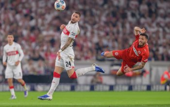 STUTTGART, GERMANY - SEPTEMBER 19: Mathias Pereira Lage of FC St. Pauli challenges Jeff Chabot of VfB Stuttgart during the Bundesliga match between VfB Stuttgart and FC St. Pauli at MHPArena on September 19, 2025 in Stuttgart, Germany. (Photo by Christian Kaspar-Bartke/Getty Images)