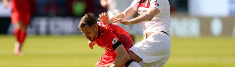 HEIDENHEIM, GERMANY - APRIL 25: Marvin Pieringer of 1. FC Heidenheim 1846 is tackled by Karol Mets of FC St. Pauli during the Bundesliga match between 1. FC Heidenheim 1846 and FC St. Pauli at Voith-Arena on April 25, 2026 in Heidenheim, Germany. (Photo by Adam Pretty/Getty Images)