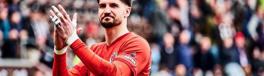 Hamburg, Deutschland, 08.03.2026, Fussball, Bundesliga, FC St. Pauli - Eintracht Frankfurt Nikola Vasilj, Torhüter des FC St. Pauli, freut sich nach dem Punktgewinn gegen Eintracht Frankfurt. Copyright: Stefan Groenveld