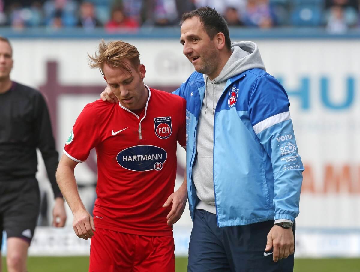 Marc Schnatterer und Frank Schmidt - viele Jahre gemeinsam die Gesichter des 1. FC Heidenheim. Hier bei einem Spiel 2014 in Rostock. // (c) Matthias Kern / Bongarts / Getty Images via OneFootball