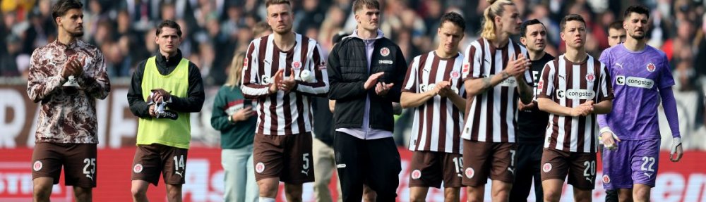 HAMBURG, GERMANY - MAY 16: Players of FC St. Pauli acknowledge the fans following confirmation of the teams relegation after the Bundesliga match between FC St. Pauli and VfL Wolfsburg at Millerntor Stadium on May 16, 2026 in Hamburg, Germany. (Photo by Selim Sudheimer/Getty Images)