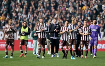 HAMBURG, GERMANY - MAY 16: Players of FC St. Pauli acknowledge the fans following confirmation of the teams relegation after the Bundesliga match between FC St. Pauli and VfL Wolfsburg at Millerntor Stadium on May 16, 2026 in Hamburg, Germany. (Photo by Selim Sudheimer/Getty Images)
