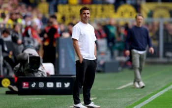 DORTMUND, GERMANY - MAY 17: Marcel Rapp, Head Coach of Holstein Kiel, gives his players instructions from the sidelines during the Bundesliga match between Borussia Dortmund and Holstein Kiel at Signal Iduna Park on May 17, 2025 in Dortmund, Germany. (Photo by Dean Mouhtaropoulos/Getty Images)